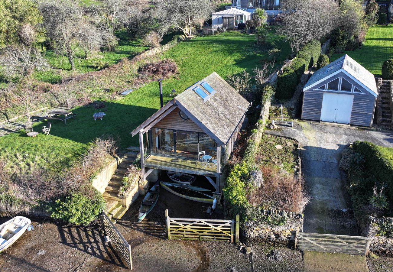 Romantic balcony dining at a unique Dittisham holiday stay with views of the River Dart.