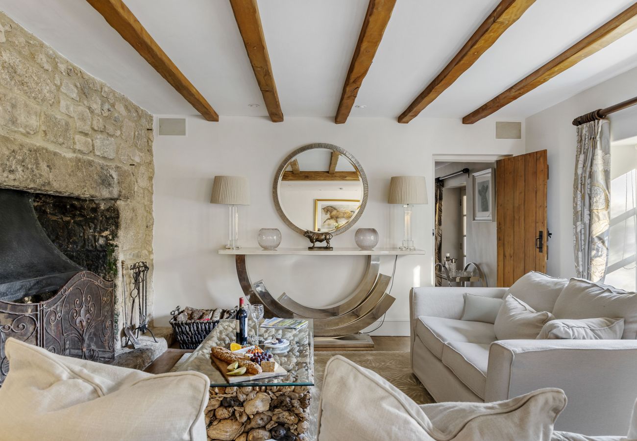 Beamed lounge with sofas and artwork