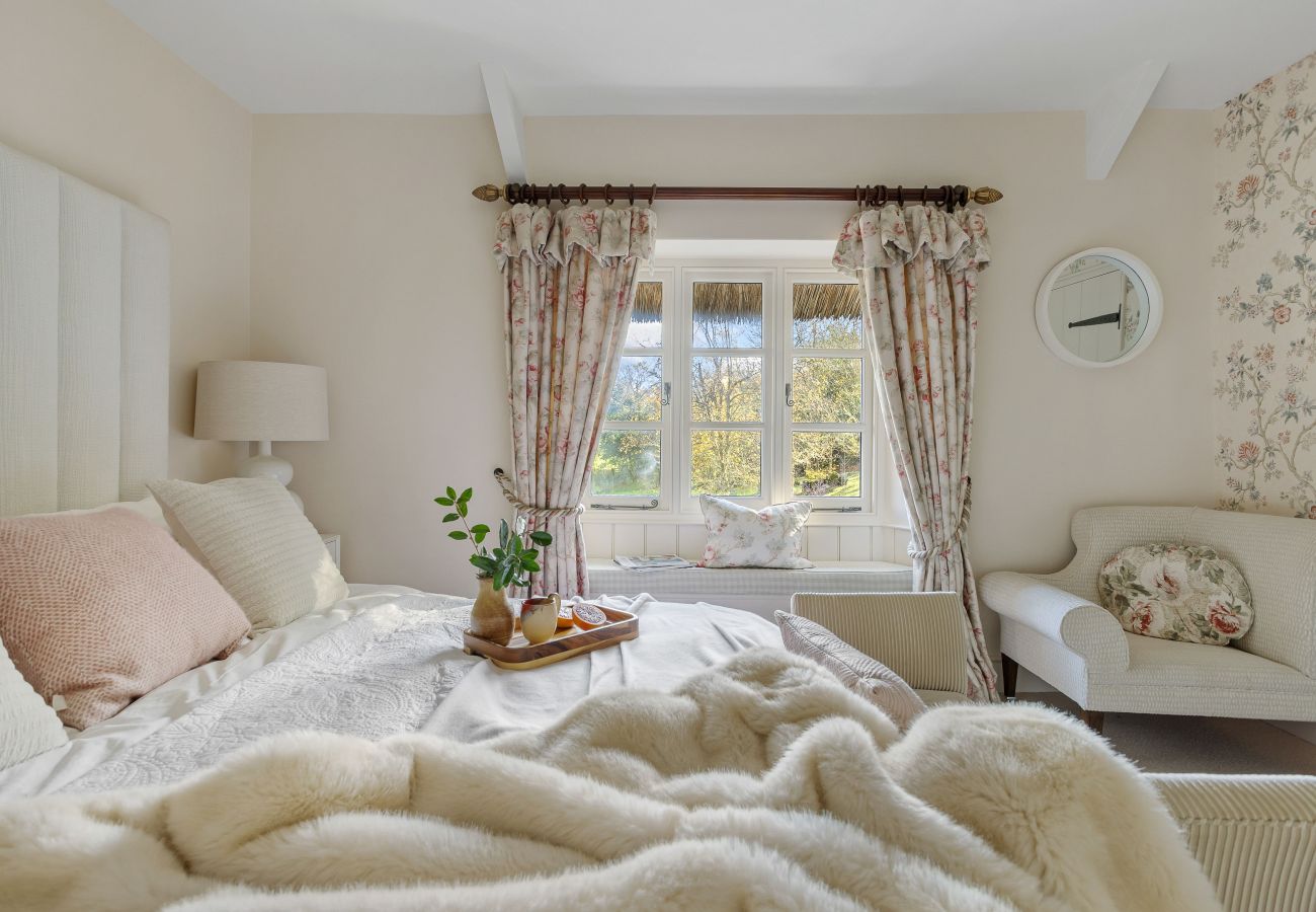 Double bedroom with light pink accents
