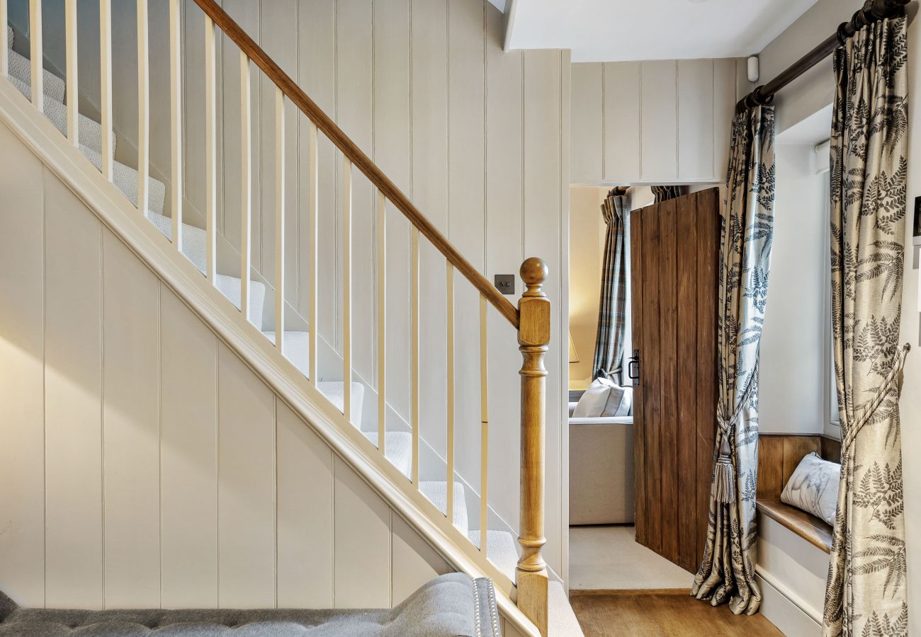 Bright stairway leading to upper floor