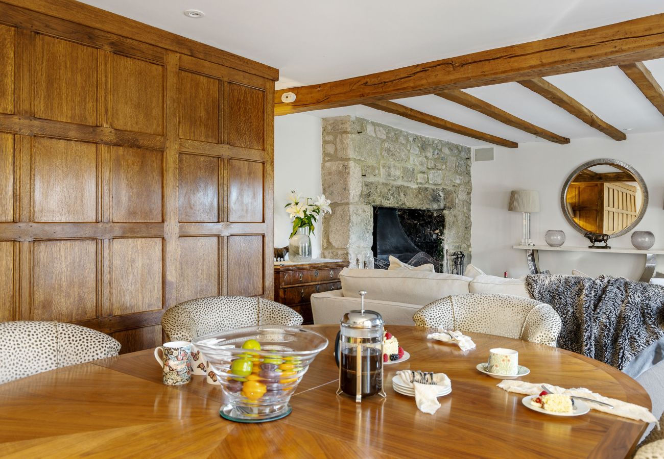 Beamed lounge with sofas and artwork