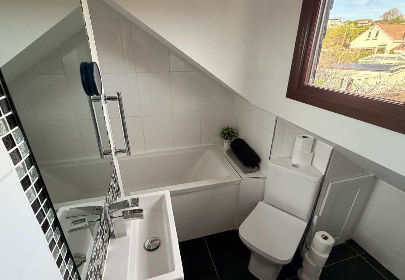 Shared 1st floor bathroom with shower in loft bedroom at Pheasants Haunt holiday home
