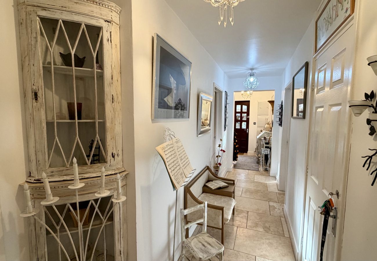 Welcoming entrance hall inside Pheasants Haunt large holiday home in South Devon