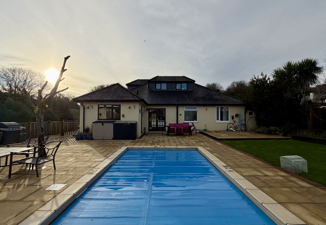 Rear exterior of Pheasants Haunt with private pool and seating area